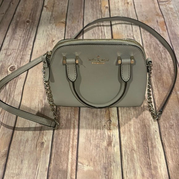 kate spade Handbags - Kate Spade mini bag with gold hardware crossbody strap GUC